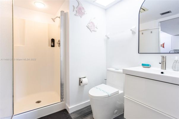 Bathroom, Glass Shower, Interior, Recessed Lighting, Wood Texture Flooring