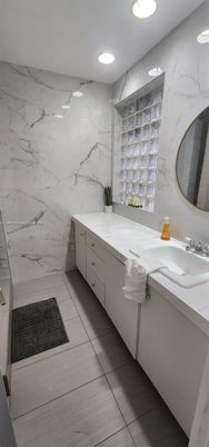 Bathroom, Dual Sink Vanities, Interior, Marble Walls, Recessed Lighting