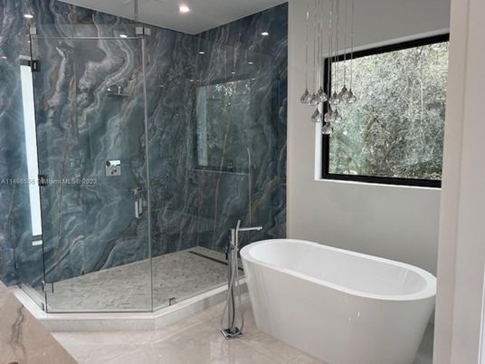 Bathroom, Free Standing Baths, Glass Shower, Interior, Marble Walls, Recessed Lighting