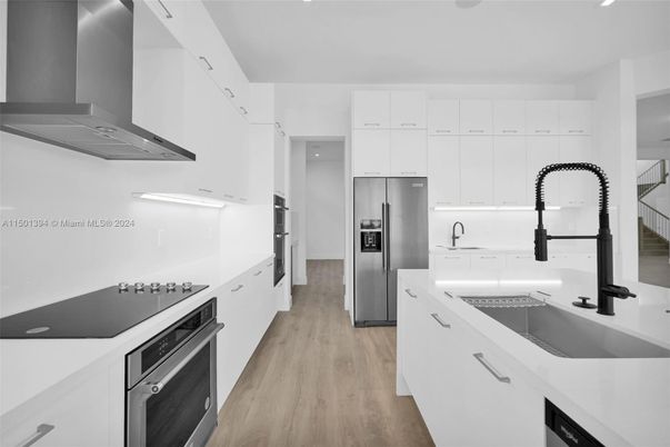 Interior, Kitchen, Recessed Lighting, Stainless Steel Appliances, Wood Texture Flooring