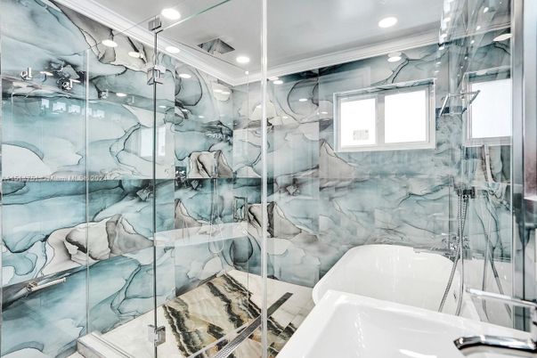 Bathroom, Free Standing Baths, Glass Shower, Interior, Marble Walls, Recessed Lighting