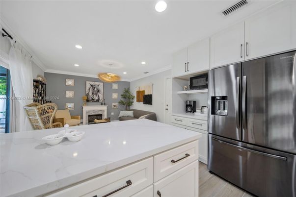 Fireplace, Interior, Kitchen, Pendant Lights, Recessed Lighting, Wood Texture Flooring