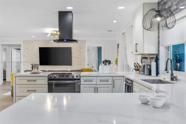 Interior, Kitchen, Pendant Lights, Recessed Lighting, Stainless Steel Appliances, Stone Walls, Wood Texture Flooring