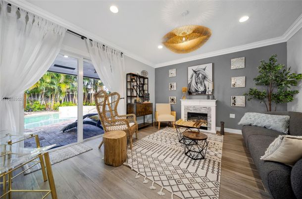 Chandelier, Fireplace, Interior, Living room, Recessed Lighting, Wood Texture Flooring