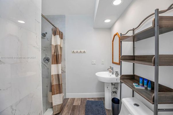 Bathroom, Interior, Marble Walls, Recessed Lighting, Wood Texture Flooring