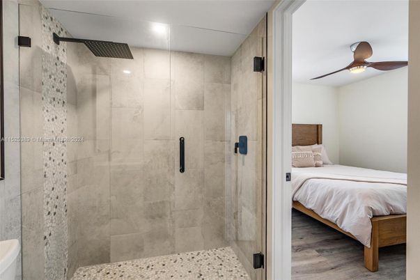 Bathroom, Bedroom, Glass Shower, Interior, Recessed Lighting, Wood Texture Flooring