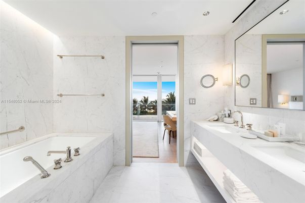 Bathroom, Dual Sink Vanities, Interior, Marble, Marble Walls, Recessed Lighting