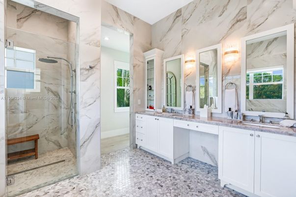 Bathroom, Dual Sink Vanities, Glass Shower, Interior, Marble Walls, Recessed Lighting