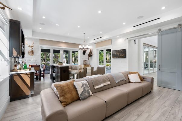 Chandelier, Dining room, Interior, Living room, Pendant Lights, Recessed Lighting, Wood Texture Flooring