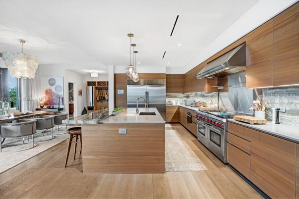 Chandelier, Dining room, Interior, Kitchen, Pendant Lights, Recessed Lighting, Stainless Steel Appliances, Wood Texture Flooring