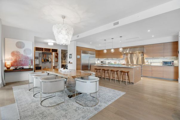 Chandelier, Dining room, Interior, Kitchen, Pendant Lights, Recessed Lighting, Stainless Steel Appliances, Wood Texture Flooring