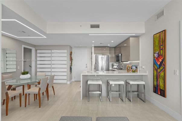 Dining room, Interior, Kitchen, Recessed Lighting, Stainless Steel Appliances, Wood Texture Flooring