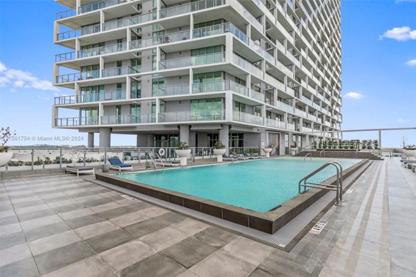 Exterior, Facade, Pool, Condo Building