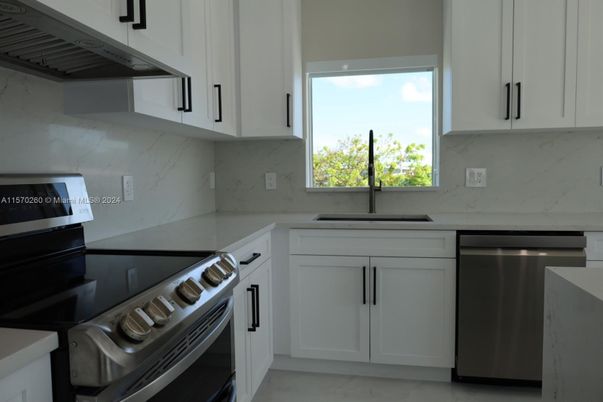 Interior, Kitchen, Marble Walls, Stainless Steel Appliances