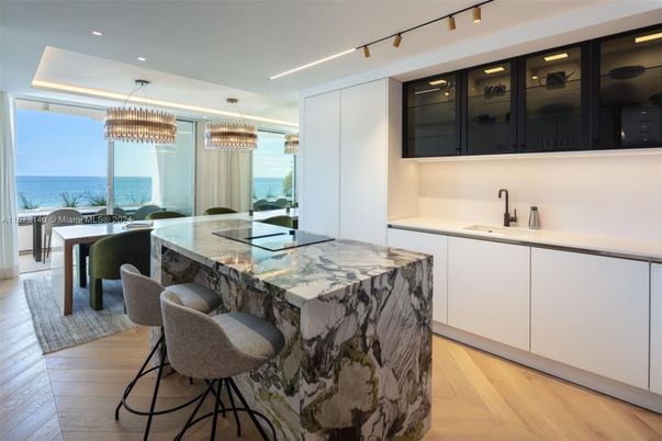 Chandelier, Dining room, Interior, Kitchen, Pendant Lights, Recessed Lighting, Water, Wood Texture Flooring