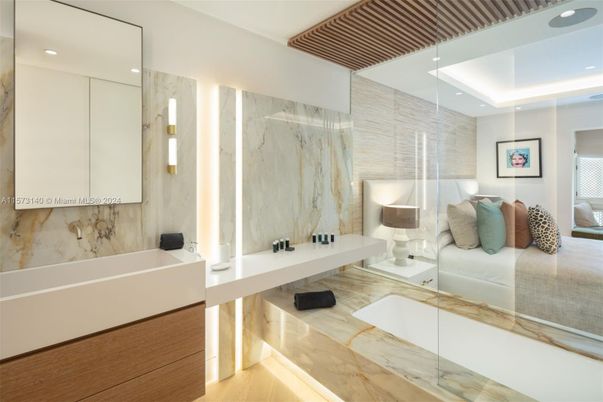 Bathroom, Glass Shower, Interior, Marble Walls, Recessed Lighting, Wood Texture Flooring