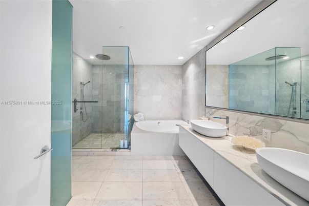 Bathroom, Dual Sink Vanities, Glass Shower, Interior, Marble Walls, Recessed Lighting