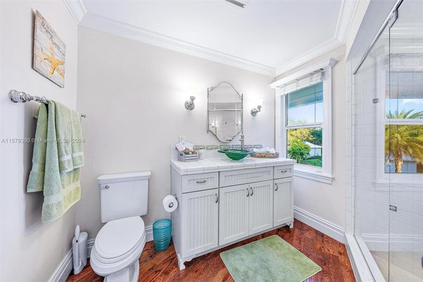 Bathroom, Glass Shower, Interior, Tile Countertops, Wood Texture Flooring