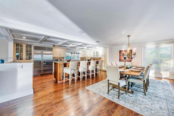 Chandelier, Dining room, Interior, Kitchen, Recessed Lighting, Stainless Steel Appliances, Wood Texture Flooring