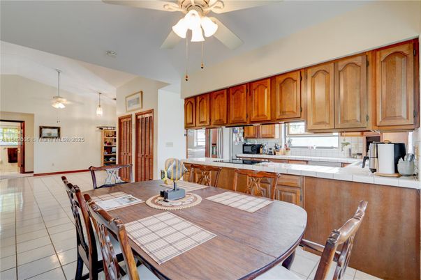Dining room, Interior, Kitchen, Pendant Lights, Tile Countertops