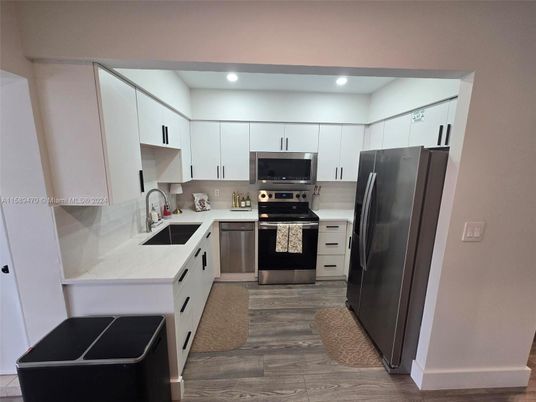 Interior, Kitchen, Recessed Lighting, Stainless Steel Appliances, Wood Texture Flooring