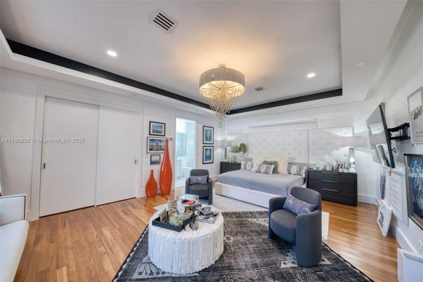 Bedroom, Chandelier, Interior, Living room, Recessed Lighting, Wood Texture Flooring
