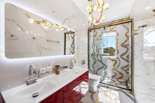 Bathroom, Dual Sink Vanities, Glass Shower, Interior, Marble Walls, Recessed Lighting
