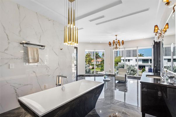 Bathroom, Free Standing Baths, Interior, Marble, Marble Walls, Pendant Lights, Recessed Lighting