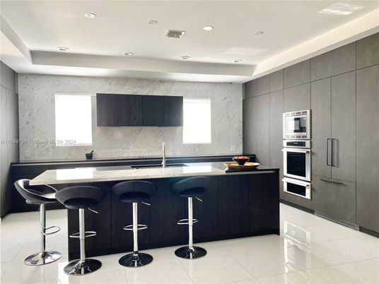 Interior, Kitchen, Marble, Marble Walls, Recessed Lighting, Stainless Steel Appliances
