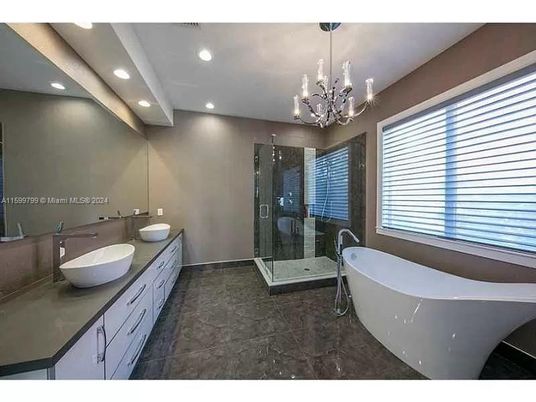 Bathroom, Chandelier, Dual Sink Vanities, Free Standing Baths, Glass Shower, Interior, Recessed Lighting