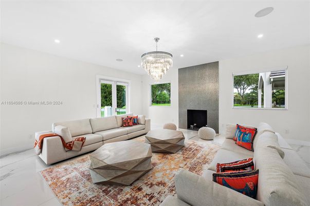 Chandelier, Fireplace, Interior, Living room, Marble, Recessed Lighting