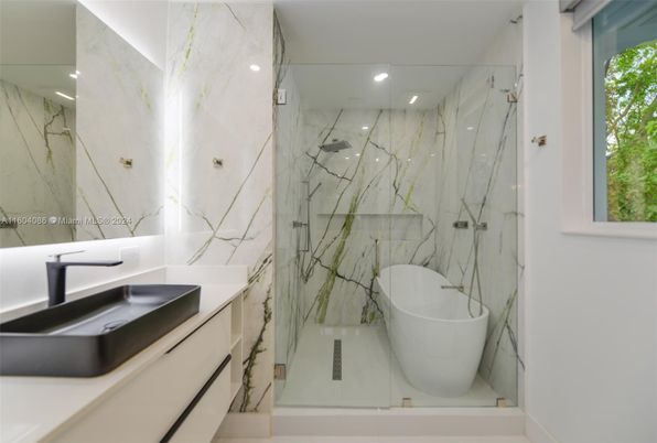 Bathroom, Free Standing Baths, Glass Shower, Interior, Marble Walls, Recessed Lighting