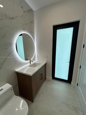 Bathroom, Dual Sink Vanities, Interior, Marble Walls, Recessed Lighting