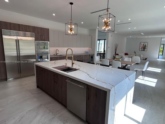 Dining room, Interior, Kitchen, Living room, Marble, Pendant Lights, Recessed Lighting, Stainless Steel Appliances