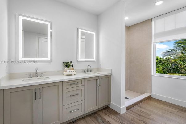 Bathroom, Dual Sink Vanities, Interior, Recessed Lighting, Wood Texture Flooring