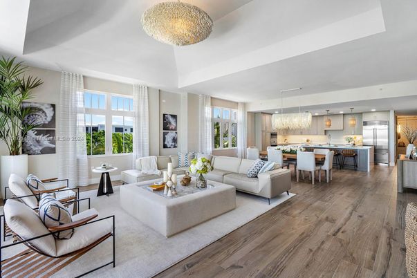 Chandelier, Dining room, Interior, Kitchen, Living room, Pendant Lights, Recessed Lighting, Stainless Steel Appliances, Wood Texture Flooring