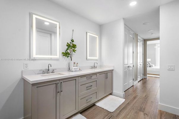 Bathroom, Dual Sink Vanities, Interior, Recessed Lighting, Wood Texture Flooring