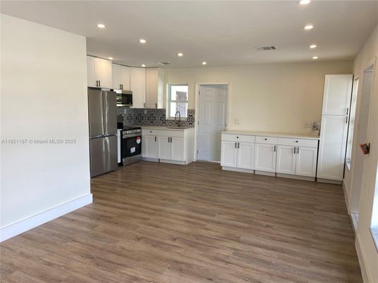 Interior, Kitchen, Recessed Lighting, Stainless Steel Appliances, Wood Texture Flooring