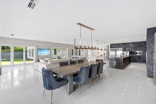 Dining room, Interior, Kitchen, Living room, Marble Walls, Pendant Lights, Recessed Lighting, Stainless Steel Appliances