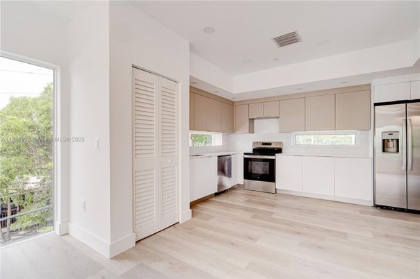 Interior, Kitchen, Recessed Lighting, Stainless Steel Appliances, Wood Texture Flooring