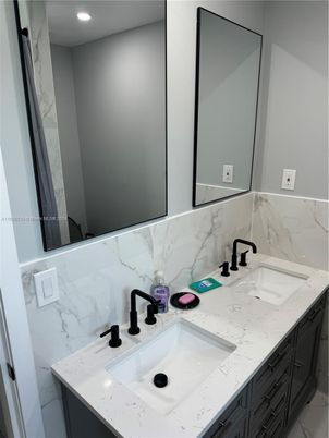 Bathroom, Dual Sink Vanities, Interior, Marble Walls, Recessed Lighting