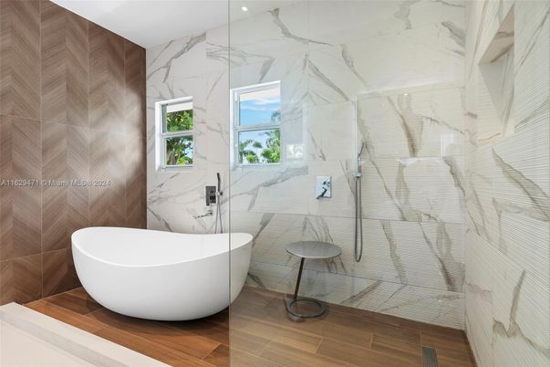 Bathroom, Free Standing Baths, Glass Shower, Interior, Marble Walls, Wood Texture Flooring