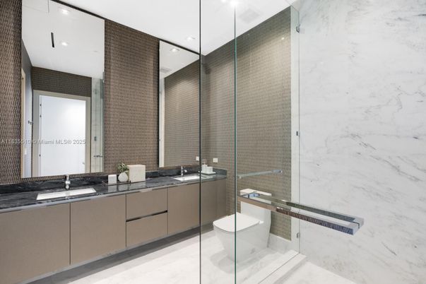 Bathroom, Dual Sink Vanities, Glass Shower, Interior, Marble Walls, Recessed Lighting