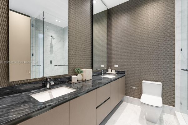 Bathroom, Dual Sink Vanities, Glass Shower, Interior, Marble, Marble Walls, Recessed Lighting