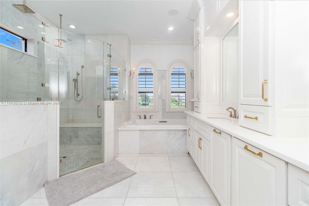 Bathroom, Dual Sink Vanities, Glass Shower, Interior, Marble Walls, Recessed Lighting