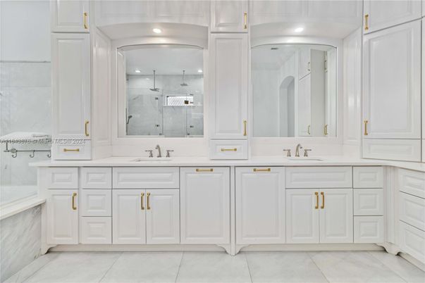 Bathroom, Dual Sink Vanities, Glass Shower, Interior, Marble Walls, Recessed Lighting