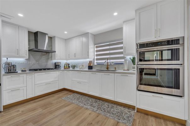 Interior, Kitchen, Recessed Lighting, Stainless Steel Appliances, Wood Texture Flooring