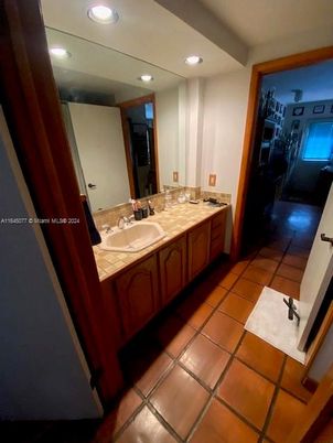 Bathroom, Dual Sink Vanities, Interior, Recessed Lighting, Tile Countertops