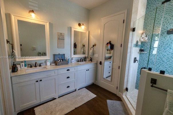 Bathroom, Dual Sink Vanities, Glass Shower, Interior, Wood Texture Flooring
