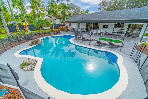Exterior, Pool, Solar Panels